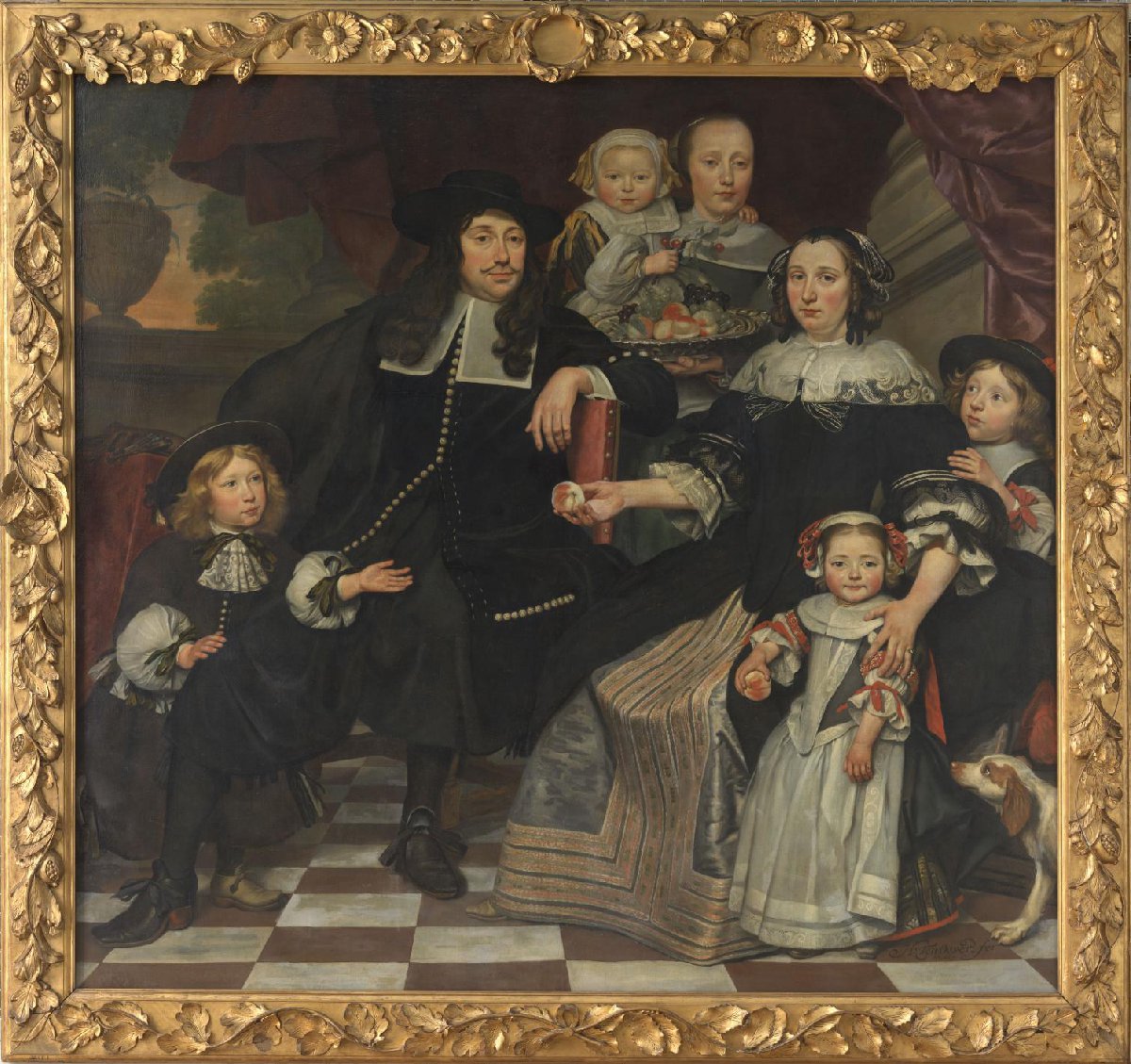 A family on the terrace of a country house
