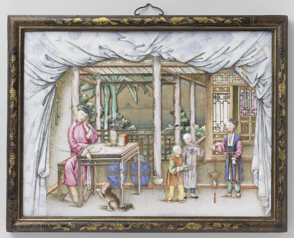 Plaque met een lezende vrouw