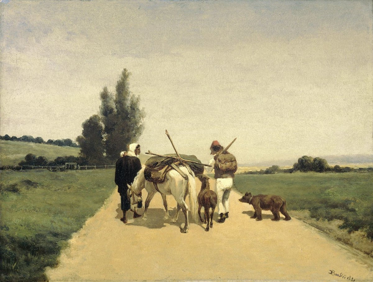 Rondtrekkende familie op een landweg