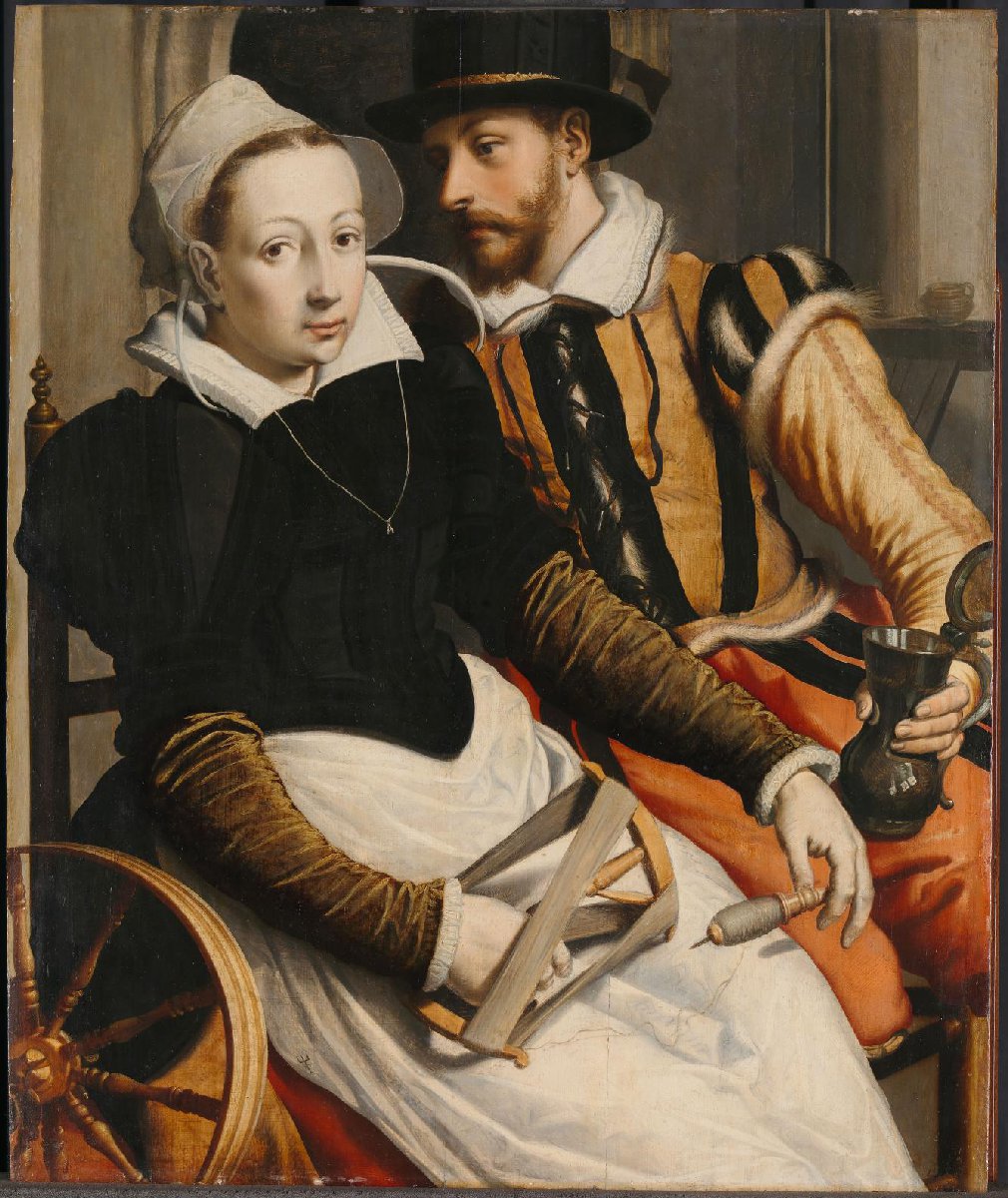 Man en vrouw bij een spinnewiel