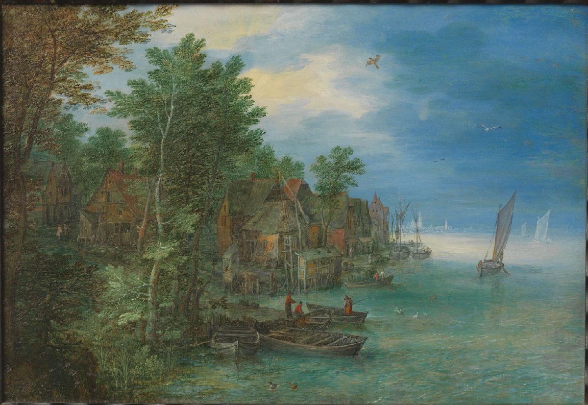 Gezicht op een dorp aan een rivier